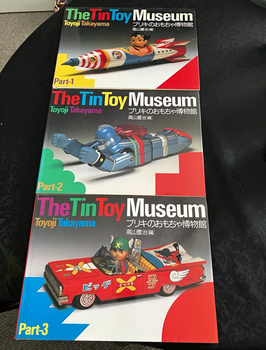 The tin toy - by, toyoji