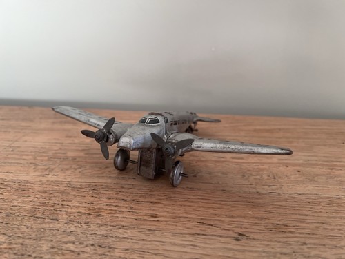 Vintage huki tin toy aeroplane - toy,