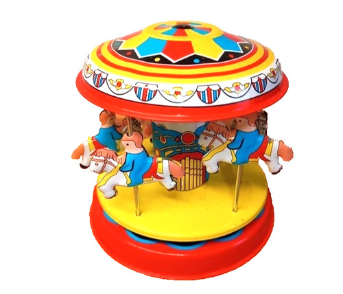 Retro lookin tin - tin, toy