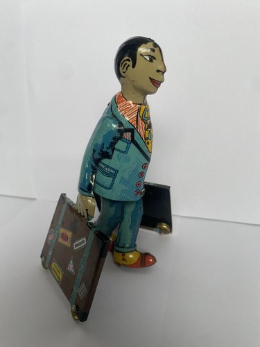 Rico wind tin toy - up,