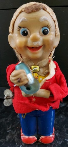 Vintage wind metal tin - up, toy